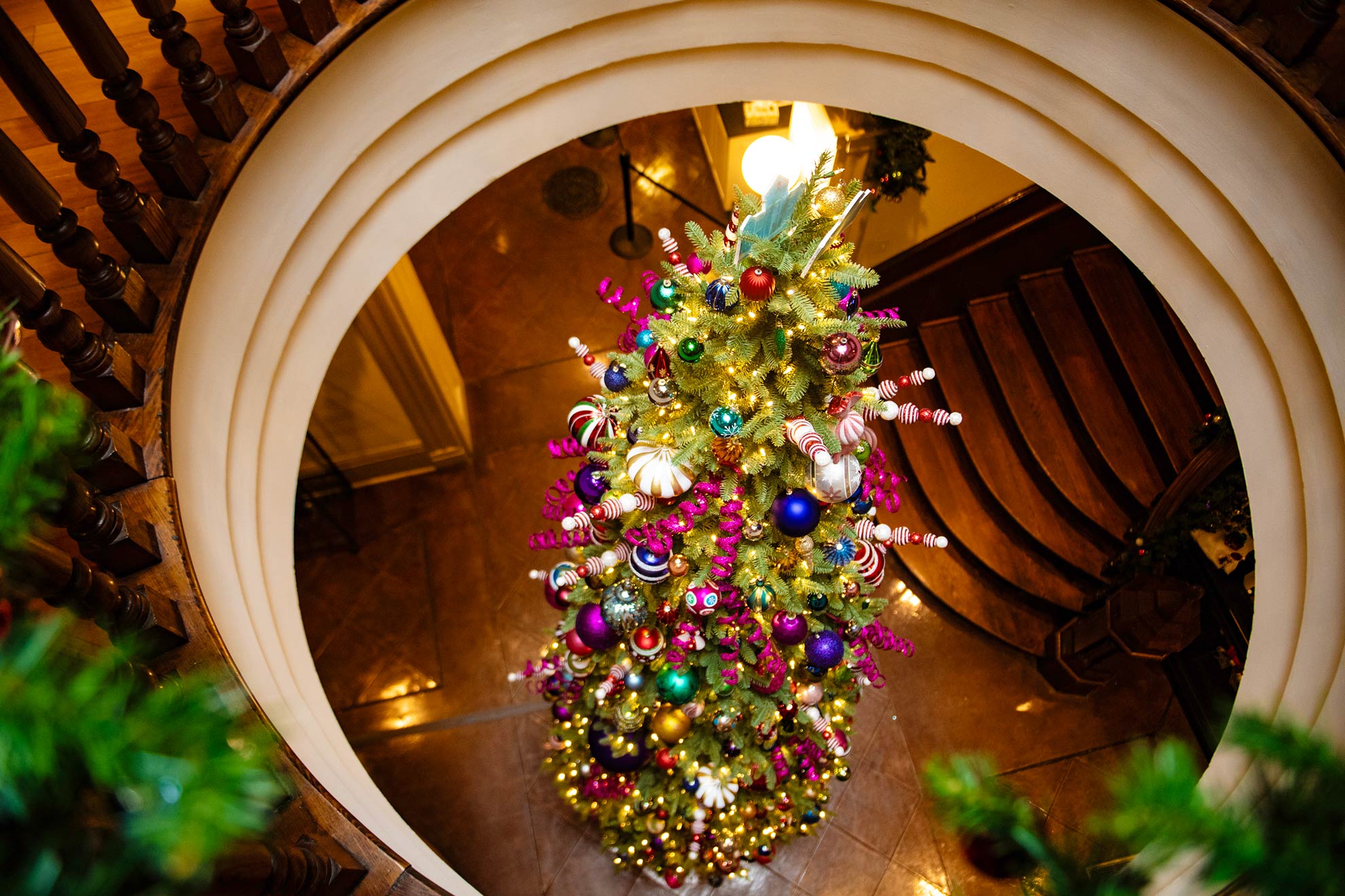 View of a Christmas Tree on the first floor from the second floor of the Old State House Museum.
