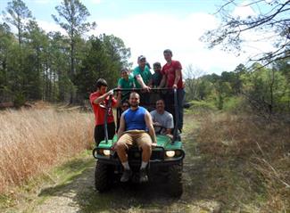 volunteers in four wheeler