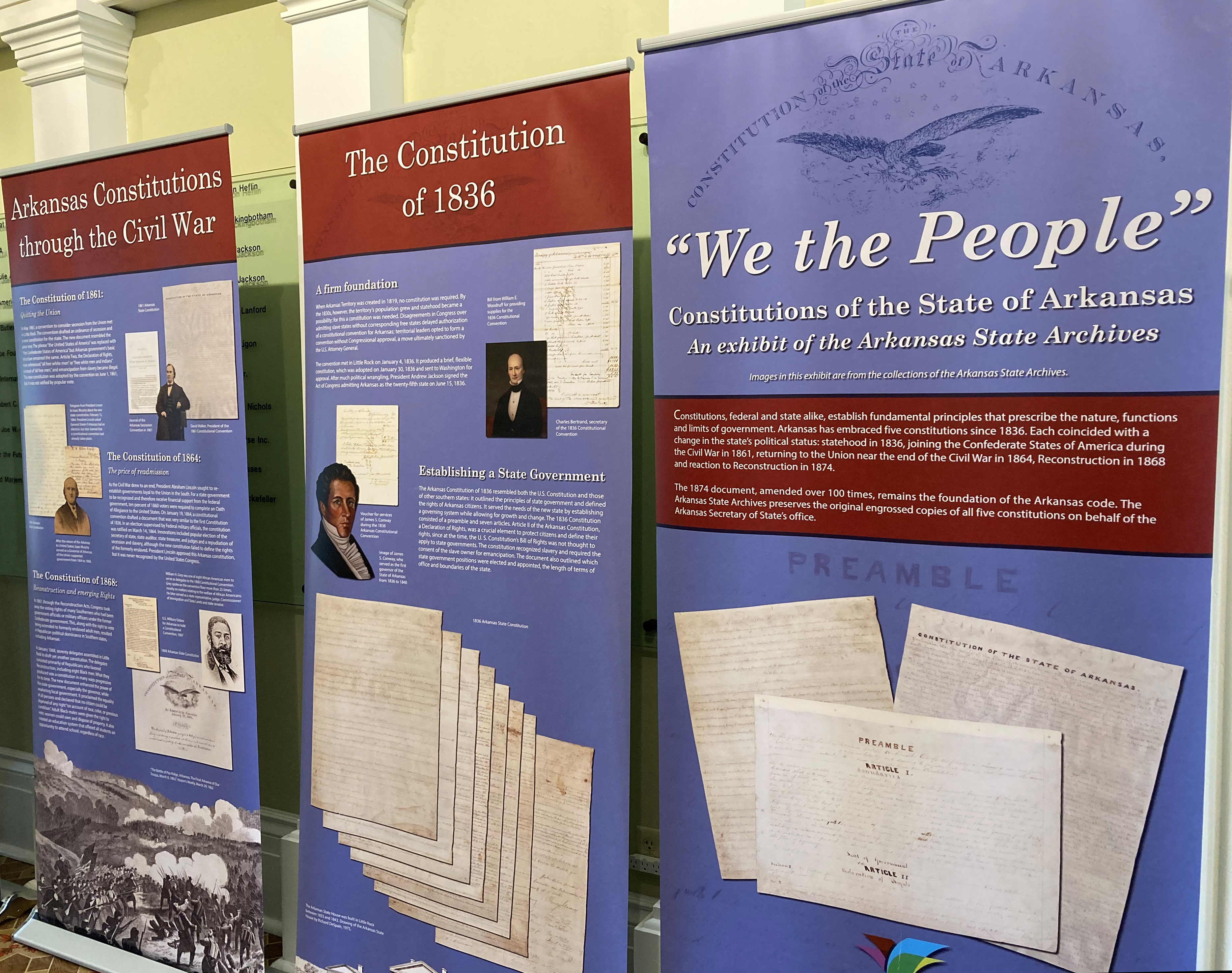 Three banners with information about the Arkansas State Constitution