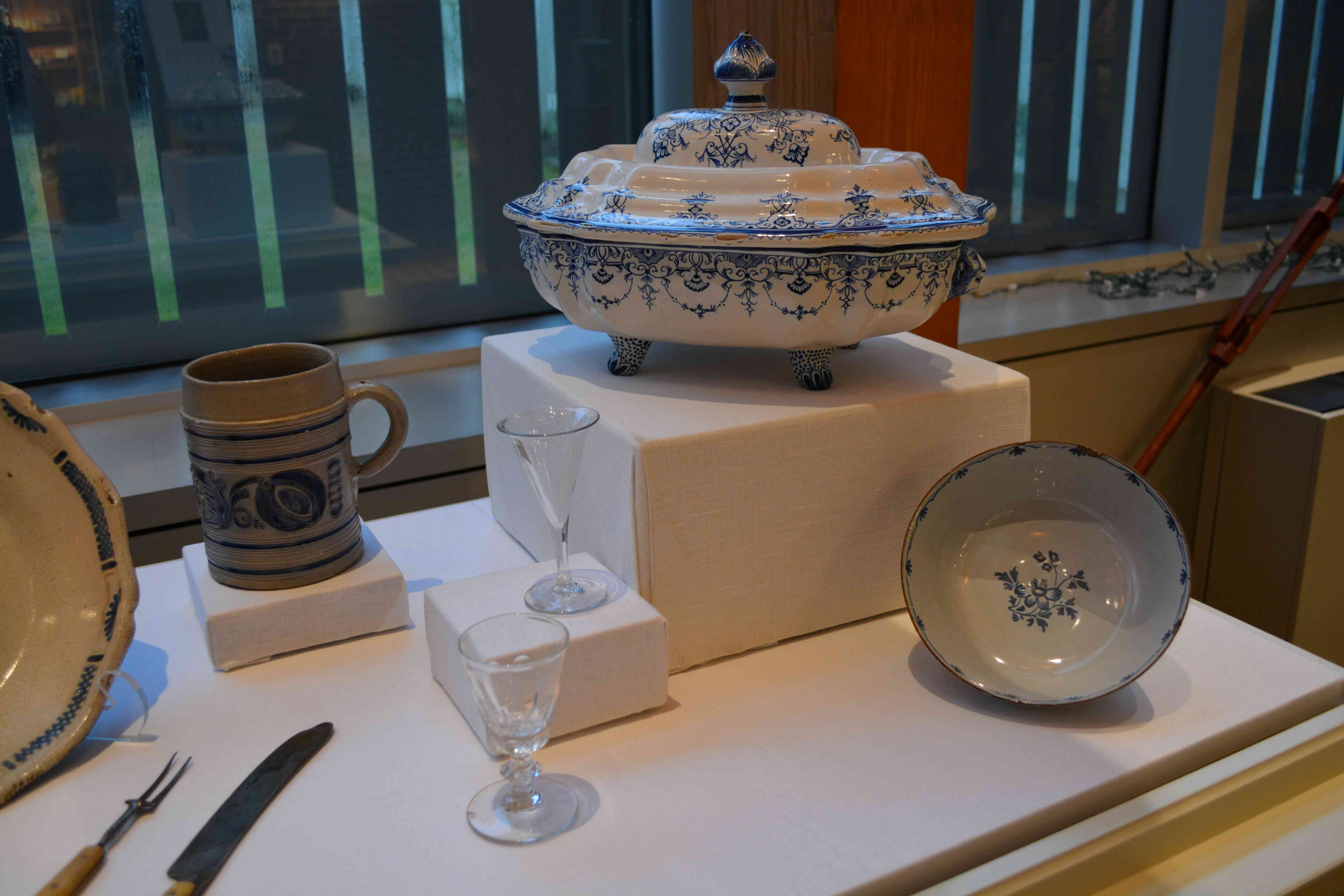 white bowl and serving dish, glass drinking glasses, beer stein