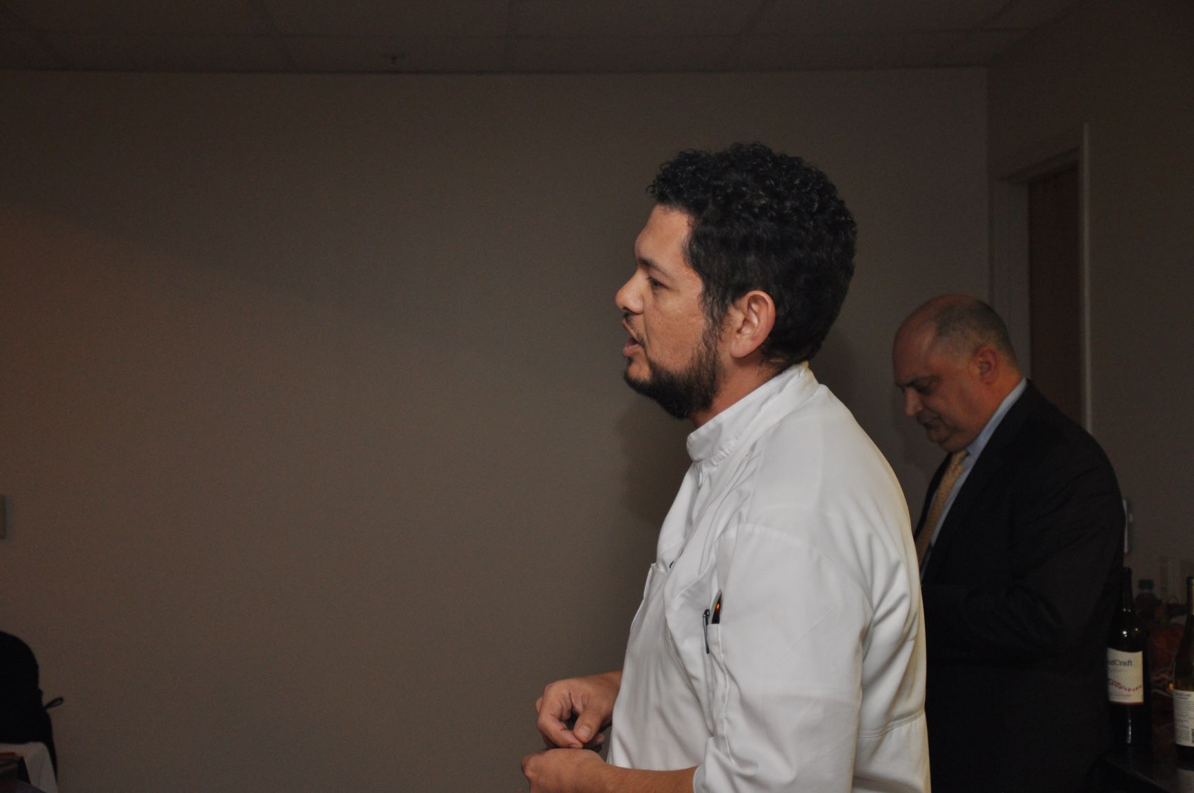 man in white shirt walking