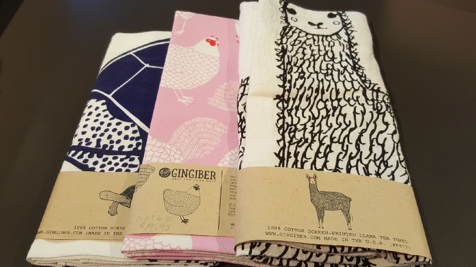 towels with turtle, hen, and llama designs