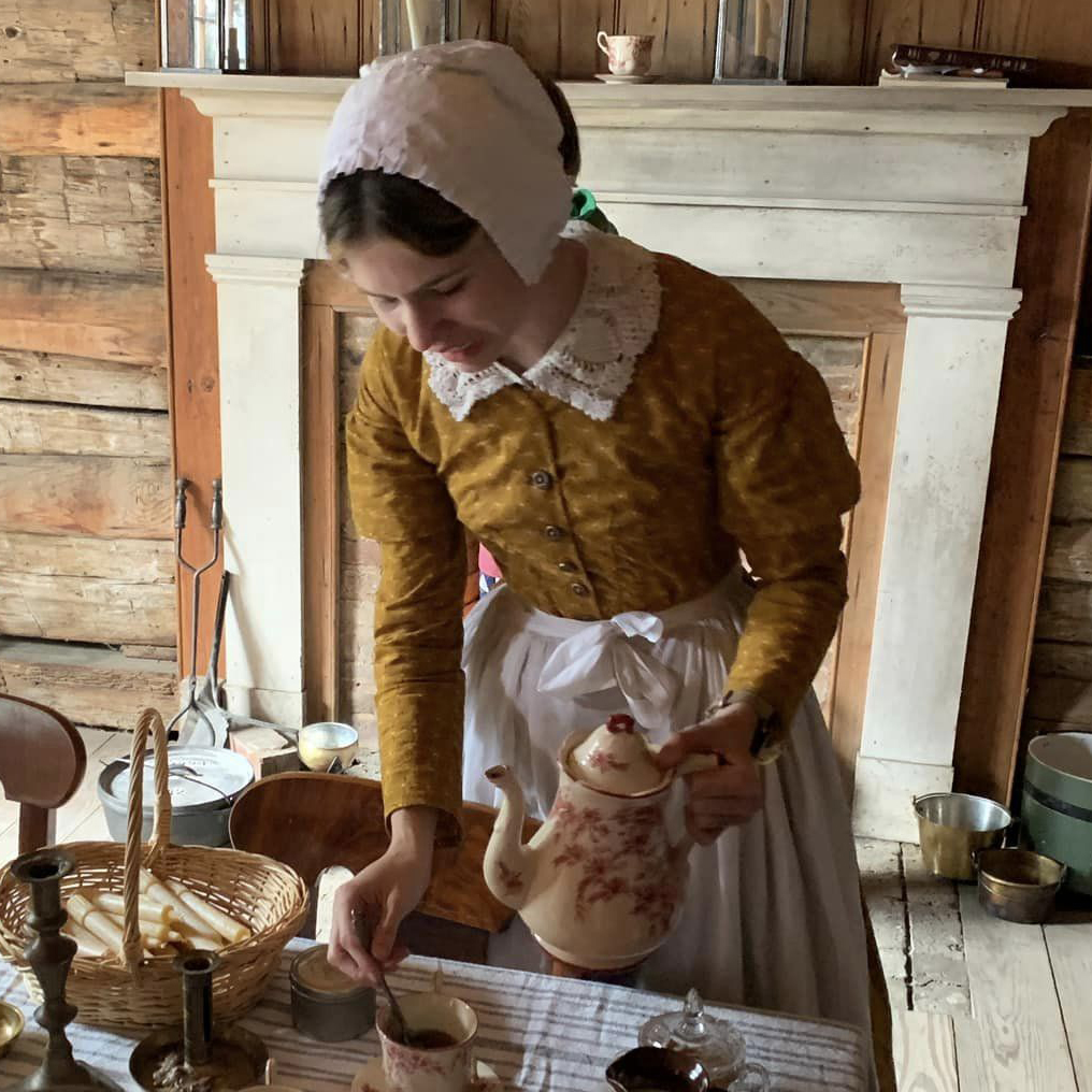 Woman pouring tea