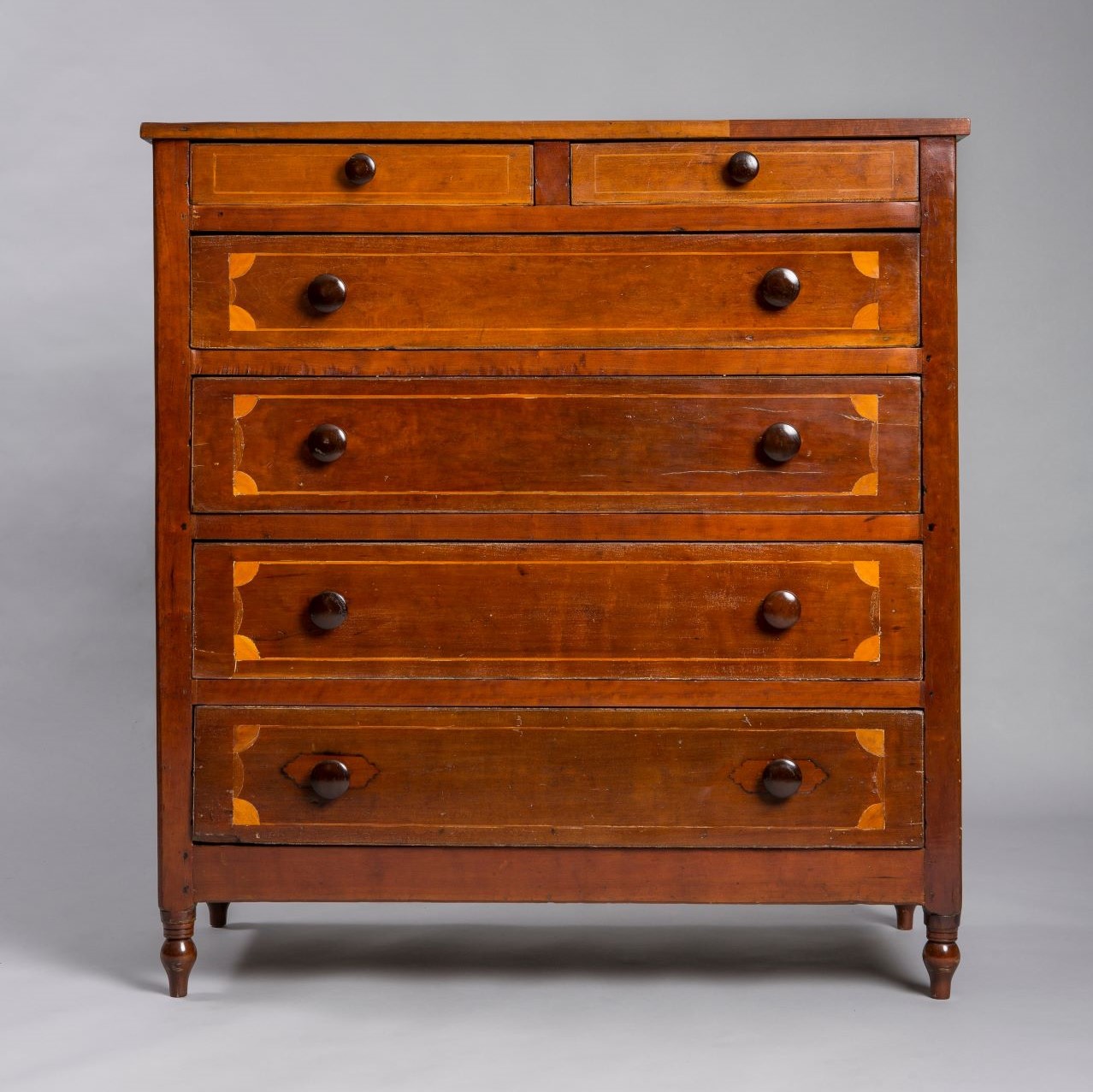 wooden chest of six drawers