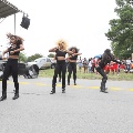 girlsinblackbootsandpantsdancingandperforminginstreet