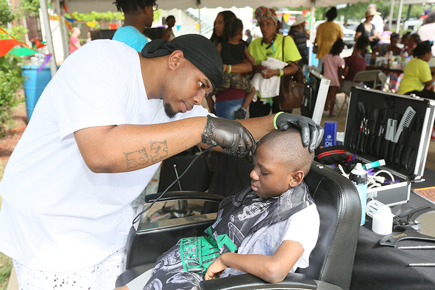 mangivingboyhaircutoutside