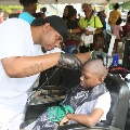 mangivingboyhaircutoutside