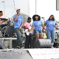 peoplesinginganddancingandplayinginstrumentsonstage