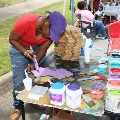 personpaintingwoodencrosspurple