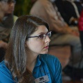 womanwithglasseswearingbluecollaredshirt