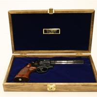 gun in wooden box