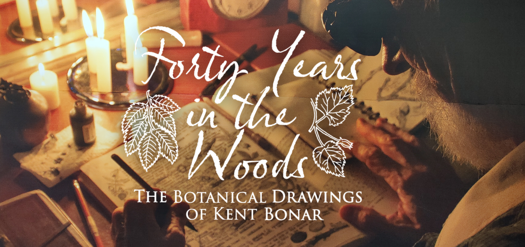 Poster of man writing in a paper notebook by candlelight with the exhibit title in white text.